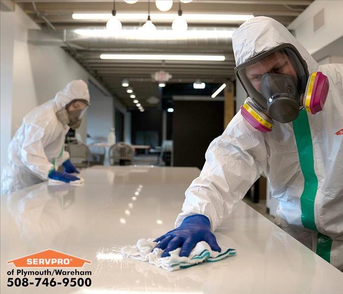 Photo of technician wiping down surfaces with our Hospital Grade Disinfectant, ServprOXIDE